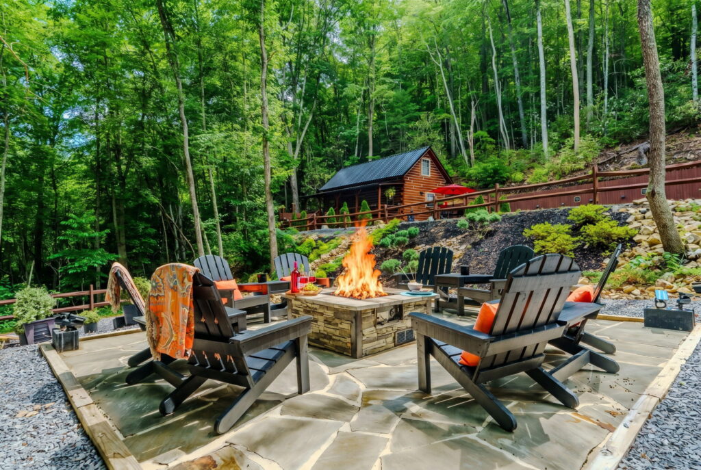 Firepit patio with both cabins in the woods, Elizabethton, Tennessee