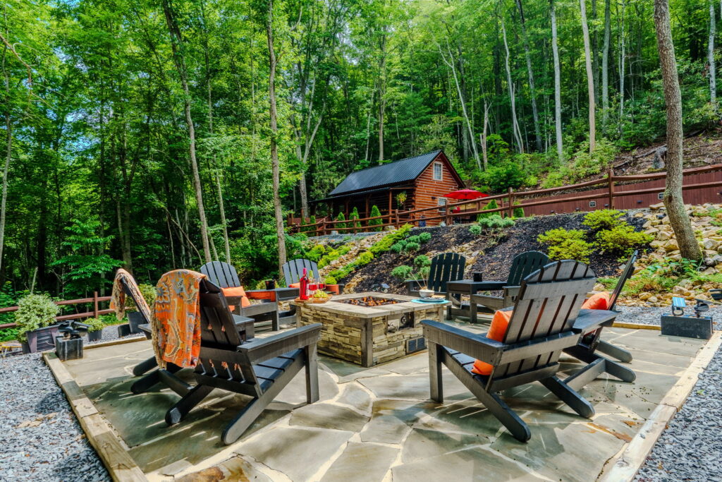 Adirondack chairs around the firepit at Monarch Mountain Cabins, Elizabethton