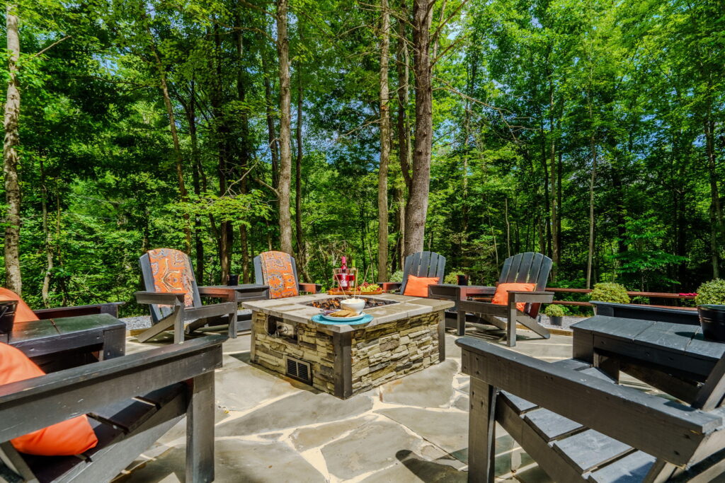 Stone firepit seating at Monarch Mountain Cabins in Elizabethton, Tennessee