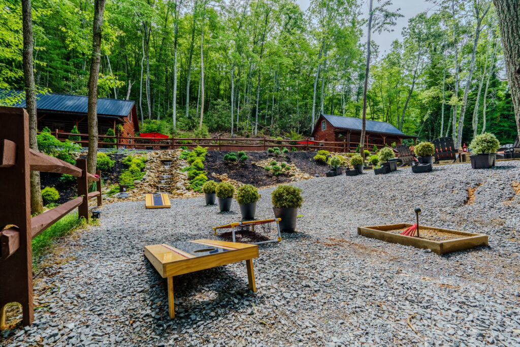 Cornhole and yard games on the shared grounds in Elizabethton, Tennessee